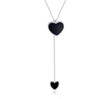 Sterling Silver Double Black Heart Necklace, featuring two black heart pendants .